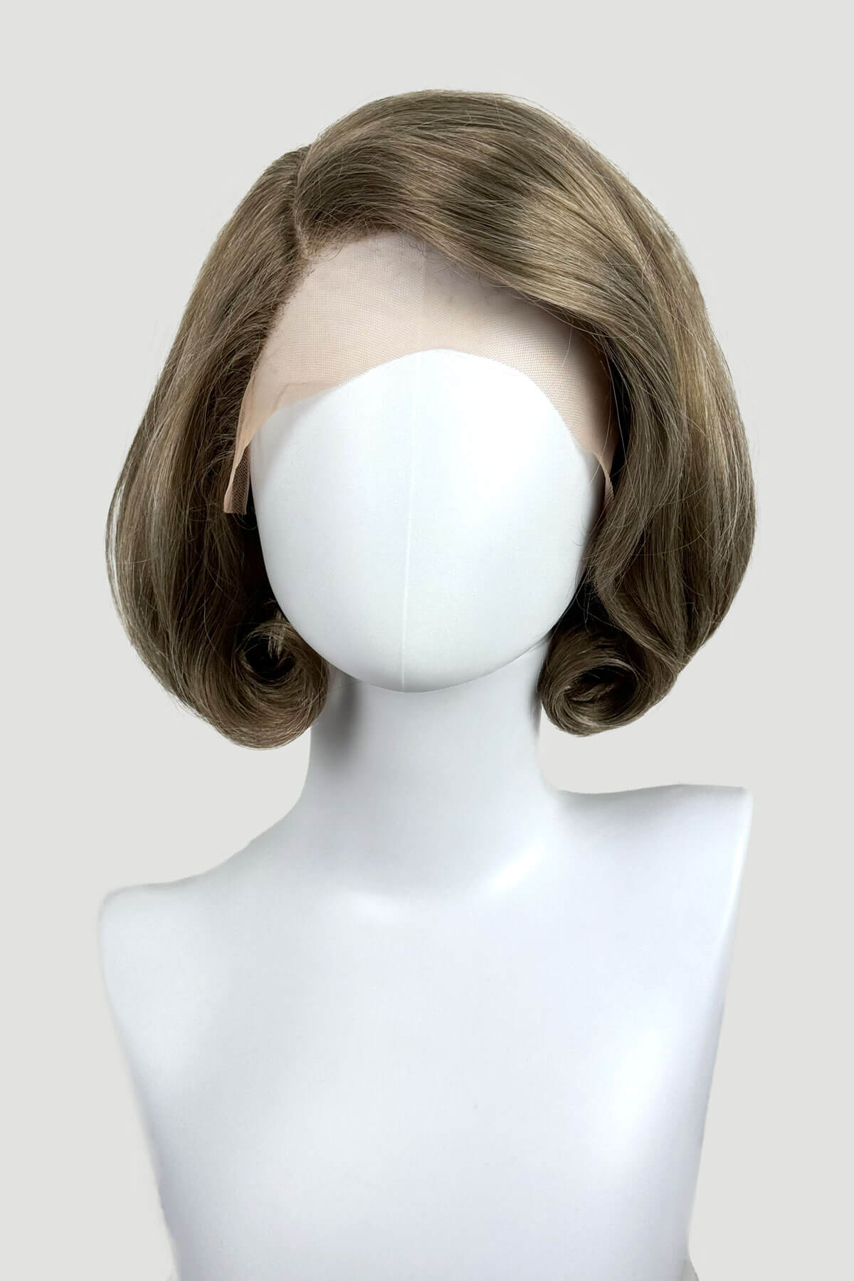 Dark golden wig, lace front, rockabilly style in rolled under pageboy style: Bobbie